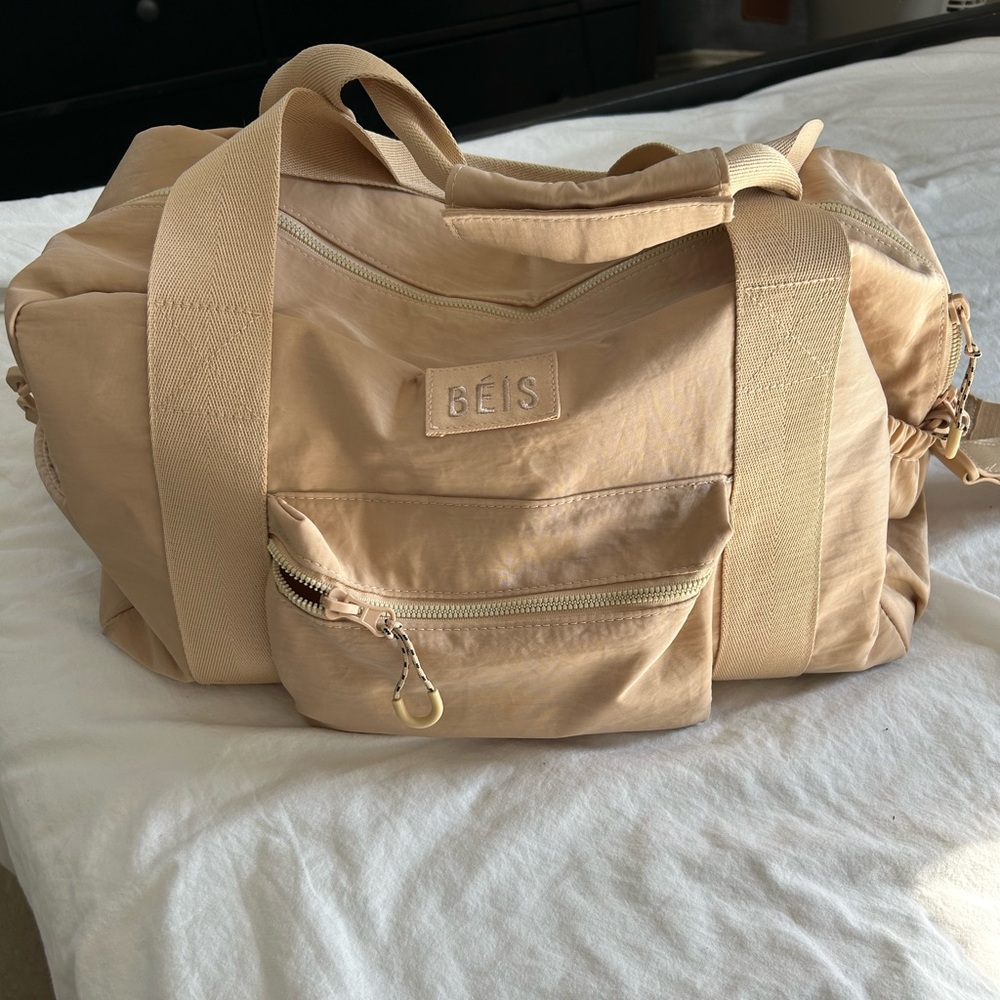 Almost brand new beige beis sports duffle bag